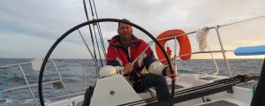 At the wheel of a Bavaria sailing boat